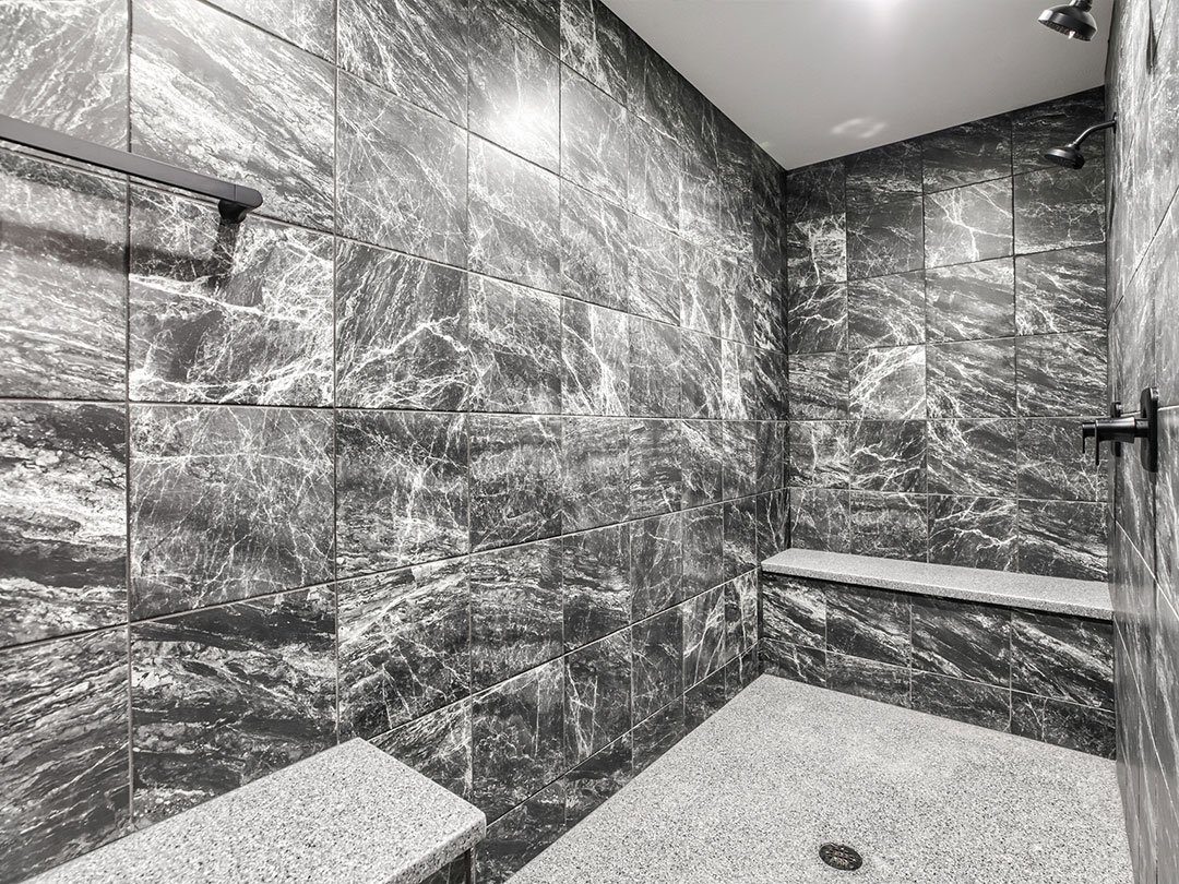 Get ready to transform your shower experience with Enstone surfaces installation! 
